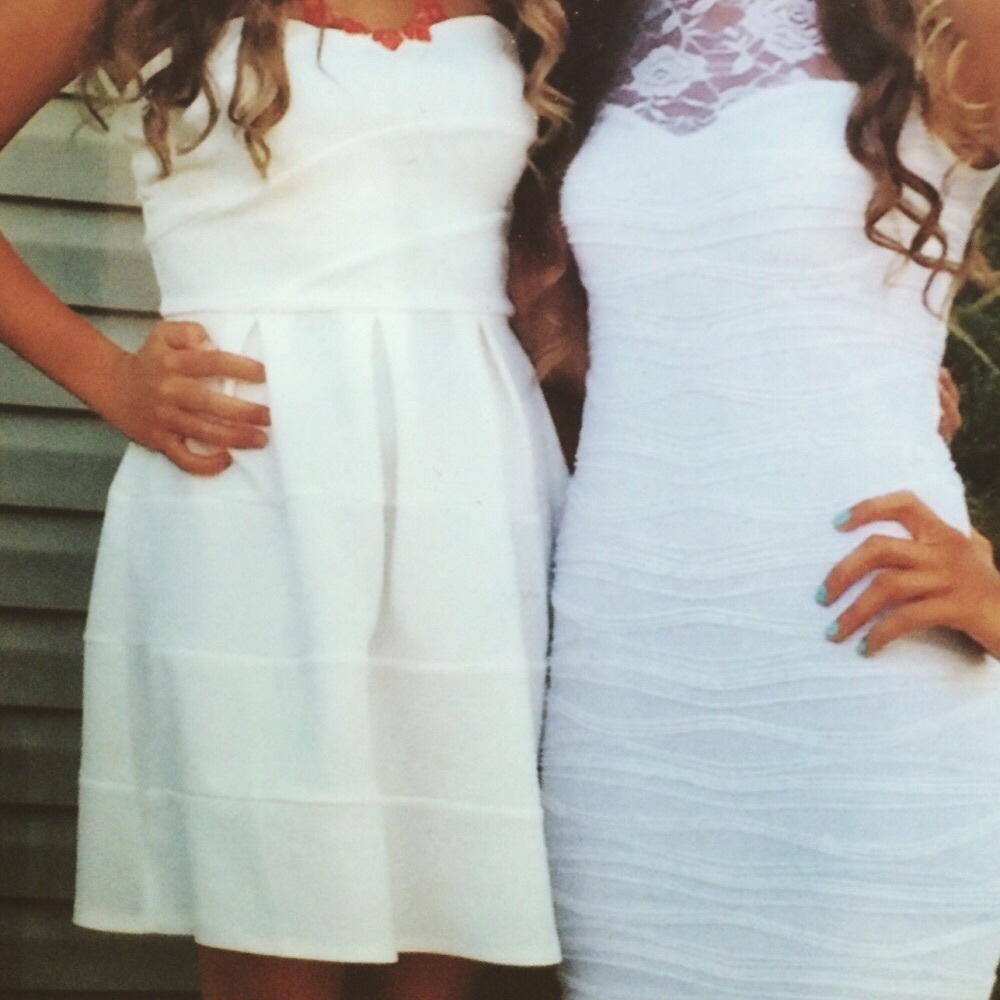 off white dress on the left